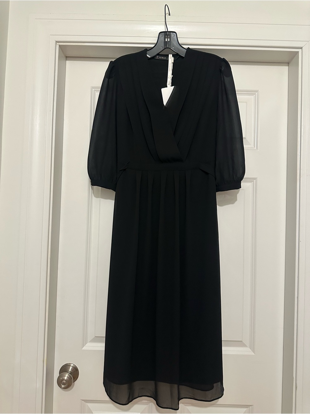 Classic Black Dress with Draped V-Neck and Puff Sleeves